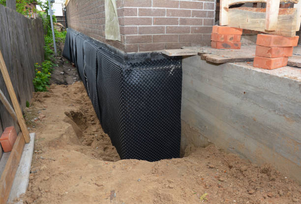 SJ Waterproofing Pros technician performing targeted Vapor Barrier Installation assessment in Smyrna, GA